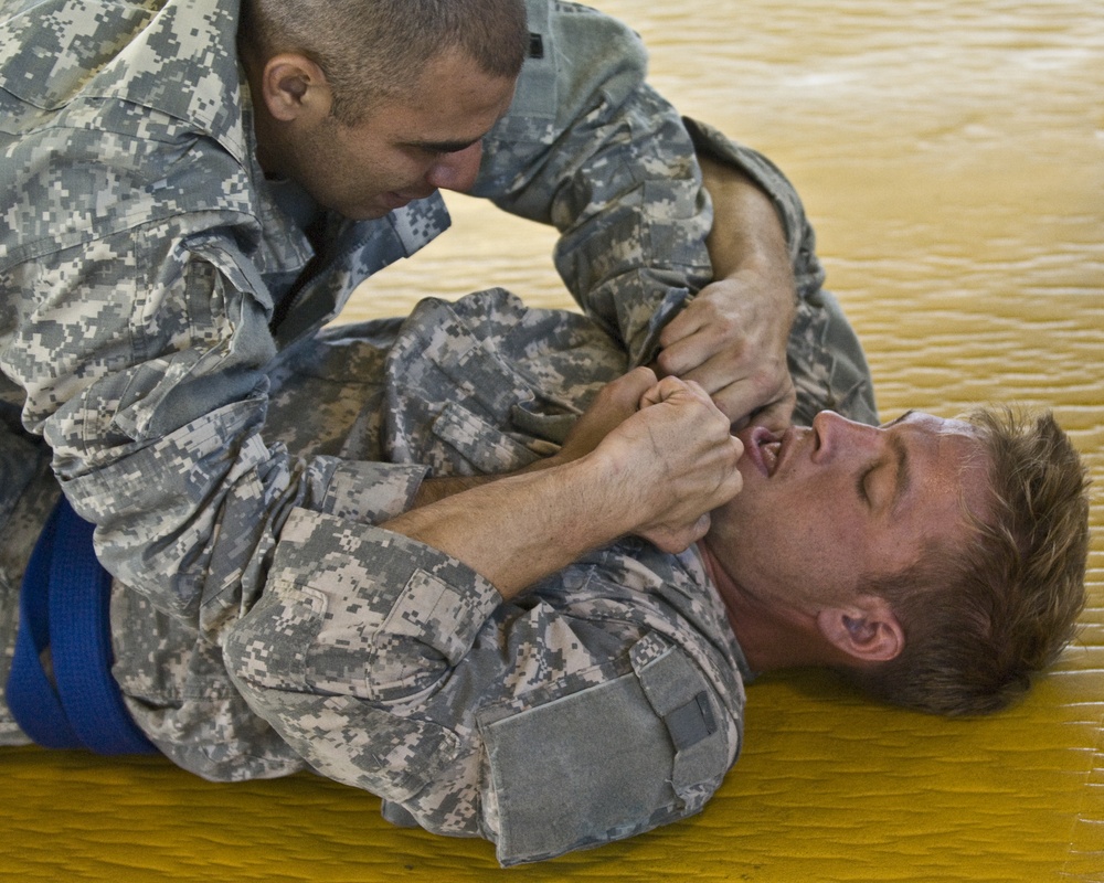 Winslow fights a cross collar choke