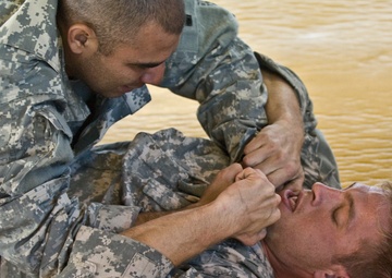 Winslow fights a cross collar choke