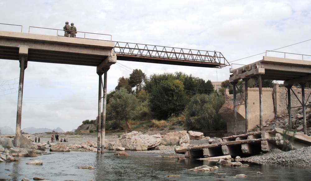 Final bridge piece pulled into place