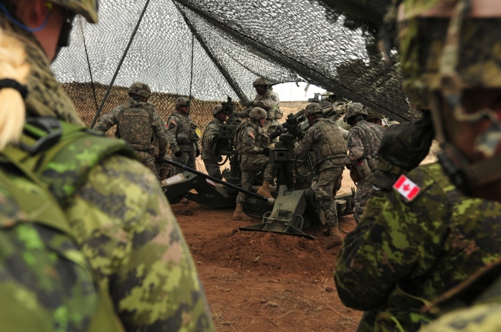 U.S.-Canadian artillery partner at YTC