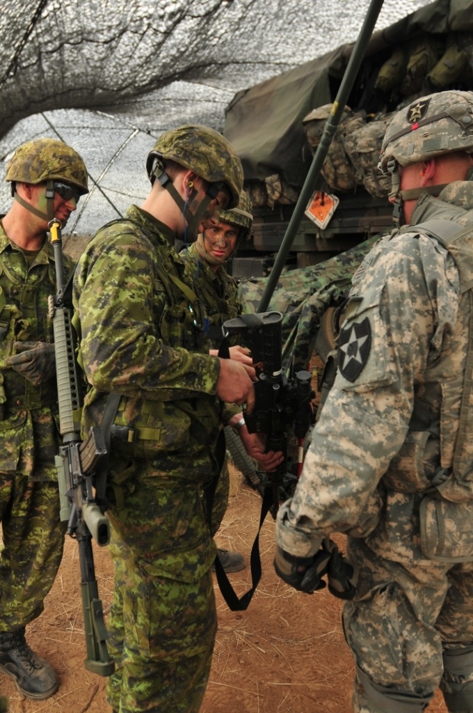 U.S.-Canadian artillery partner at YTC