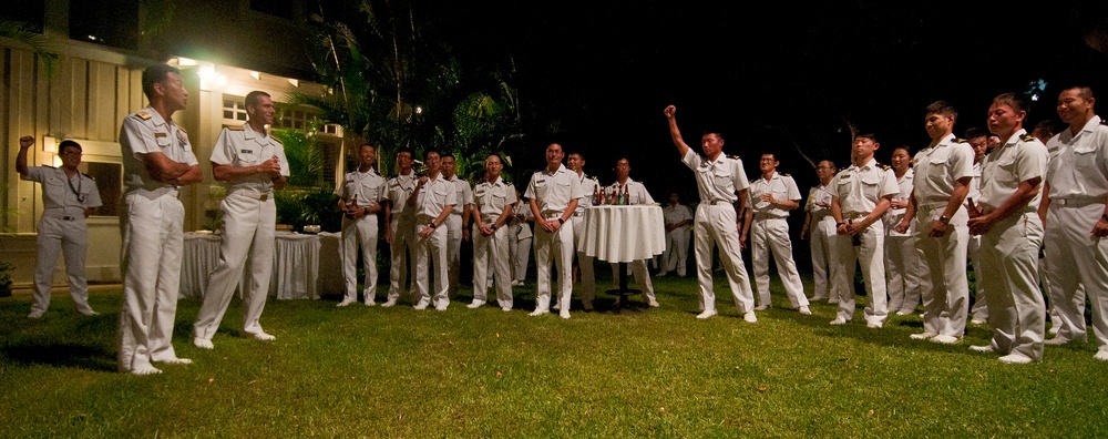 Sailor attend a reception at Joint Base Pearl Harbor-Hickam