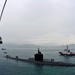 USS Columbia beside USS Emory S. Land in Malaysia