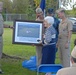 Capt. Slade Cutter's wife receives photo at park dedication