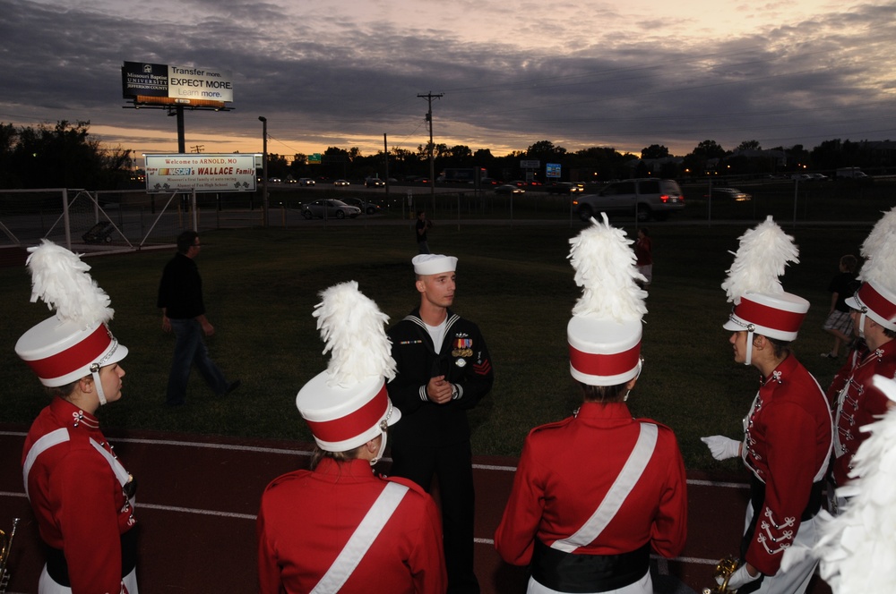 Sailor mentors high school band
