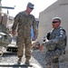 Sgt. Maj. of the Army speaks with soldier about Strykers