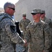 Sgt. Maj. of the Army presents coin to Arctic Wolves soldier