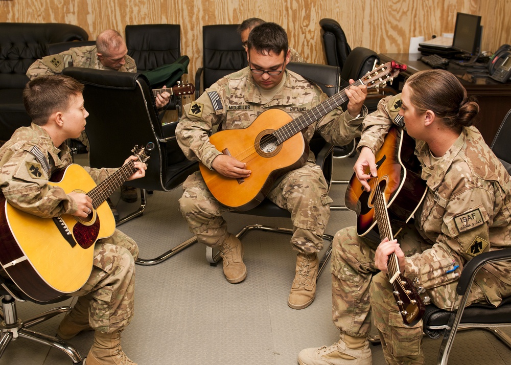 Soldiers pass time with music