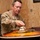 Soldiers pass time with music