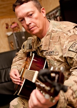 Soldiers pass time with music