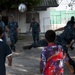 USS Mustin sailors play soccer with Thai children