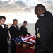 USS Dwight D. Eisenhower honor guard perform a burial at sea