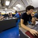 USS John C. Stennis sailors use computer lab