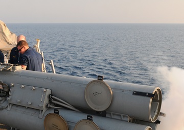 USS Mitscher sonar technicians perform maintenance