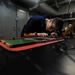 USS George H.W. Bush sailors work on electronics