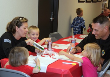 3rd AABn. families come together for children’s book exchange