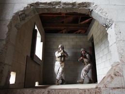 Military policemen attack MOUT town
