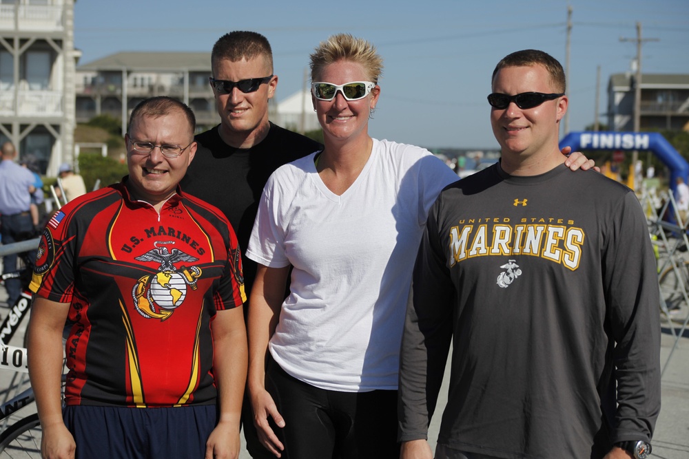 Wounded Warriors conquer triathlon: Four Marines run, swim, bike to finish line