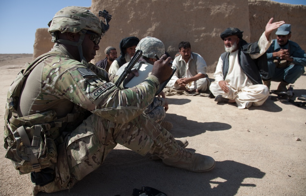 Afghan and US forces meet with local leaders in Ulagay