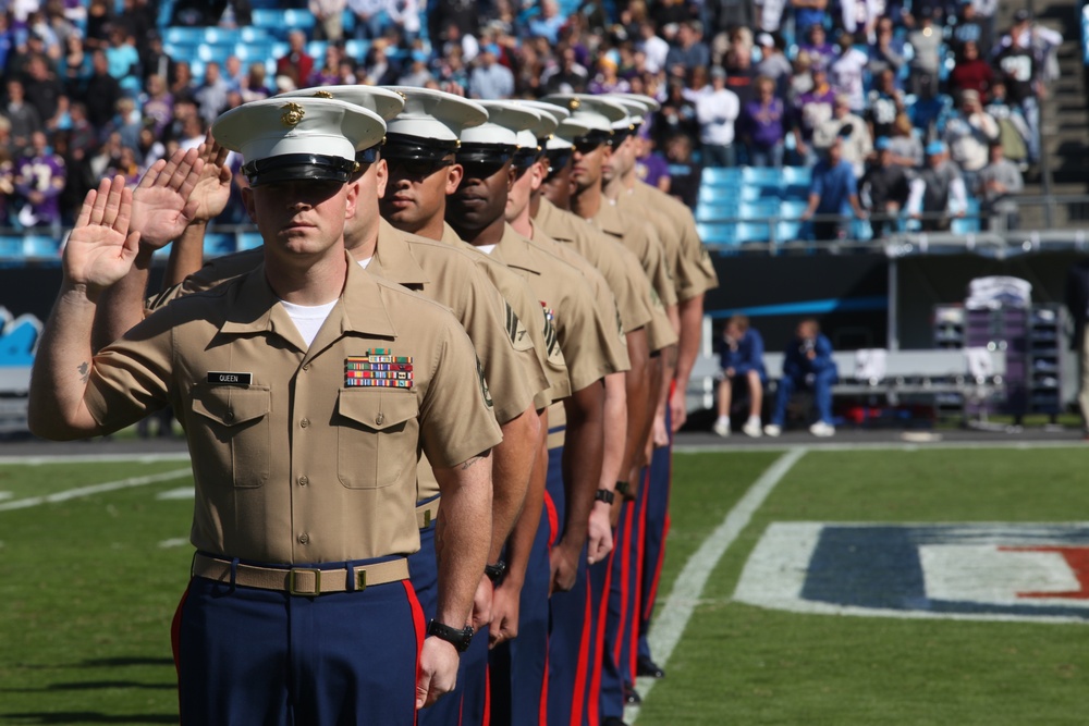 Camp Lejeune Marines re-enlist at Carolina Panthers NFL game