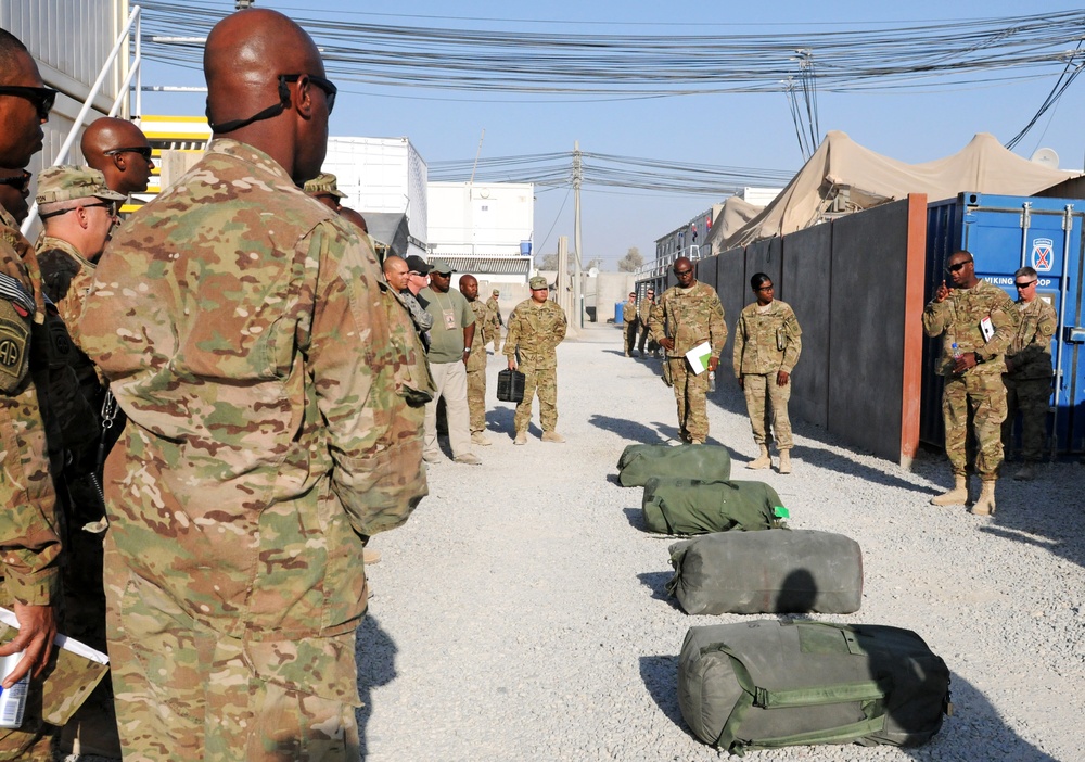 Command Sgt. Maj. Lambert speaks to Regional Command (South) leadership during military working dog demonstration