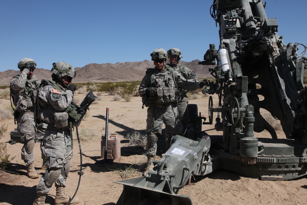 Shooting of a rare round, Excalibur, out of a M-777 A2 Weapon System by the 1-37th Field Artillery Unit at Fort Irwin, Calif.