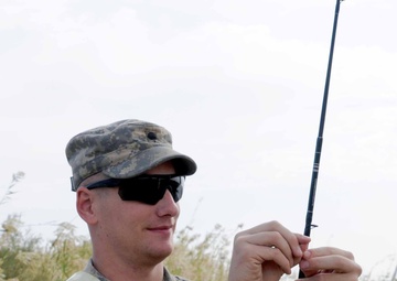 Soldiers enjoy desert fishing during deployment