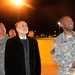 The chairman of the Federal Reserve greets troops as the return home from Iraq