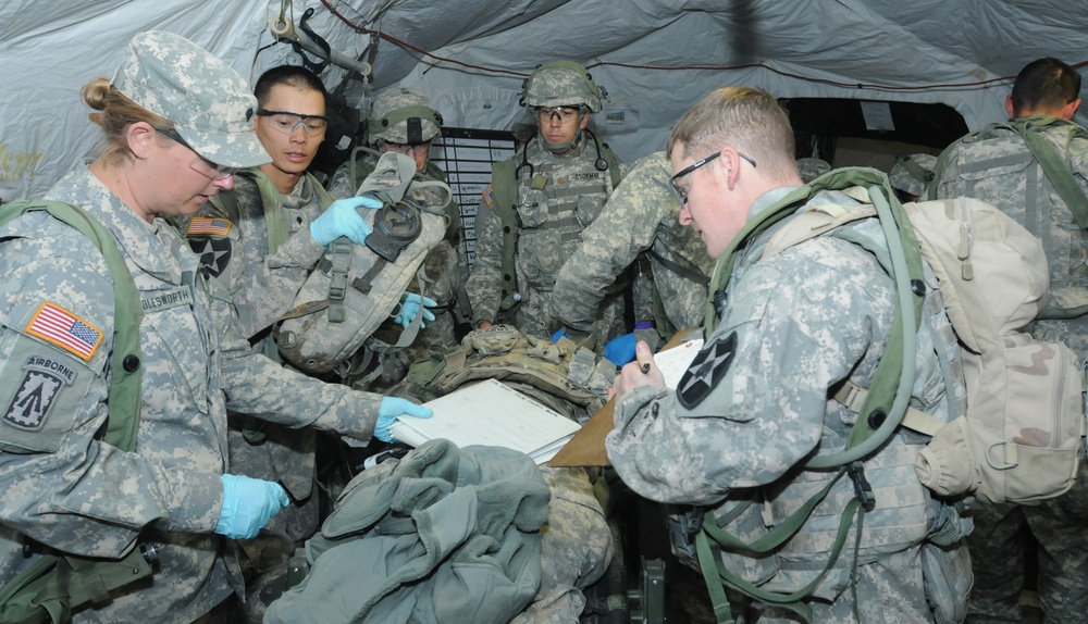 Combat aid station displays medical skills during “controlled chaos”