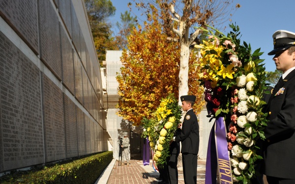 Navy JrROTC cadets lay wreathes at Florence American Cemetery