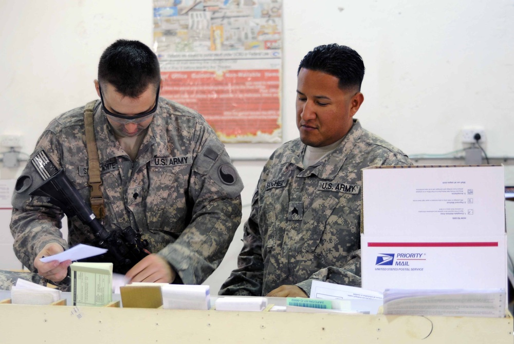Postal services stop for service members another sign service members are heading home