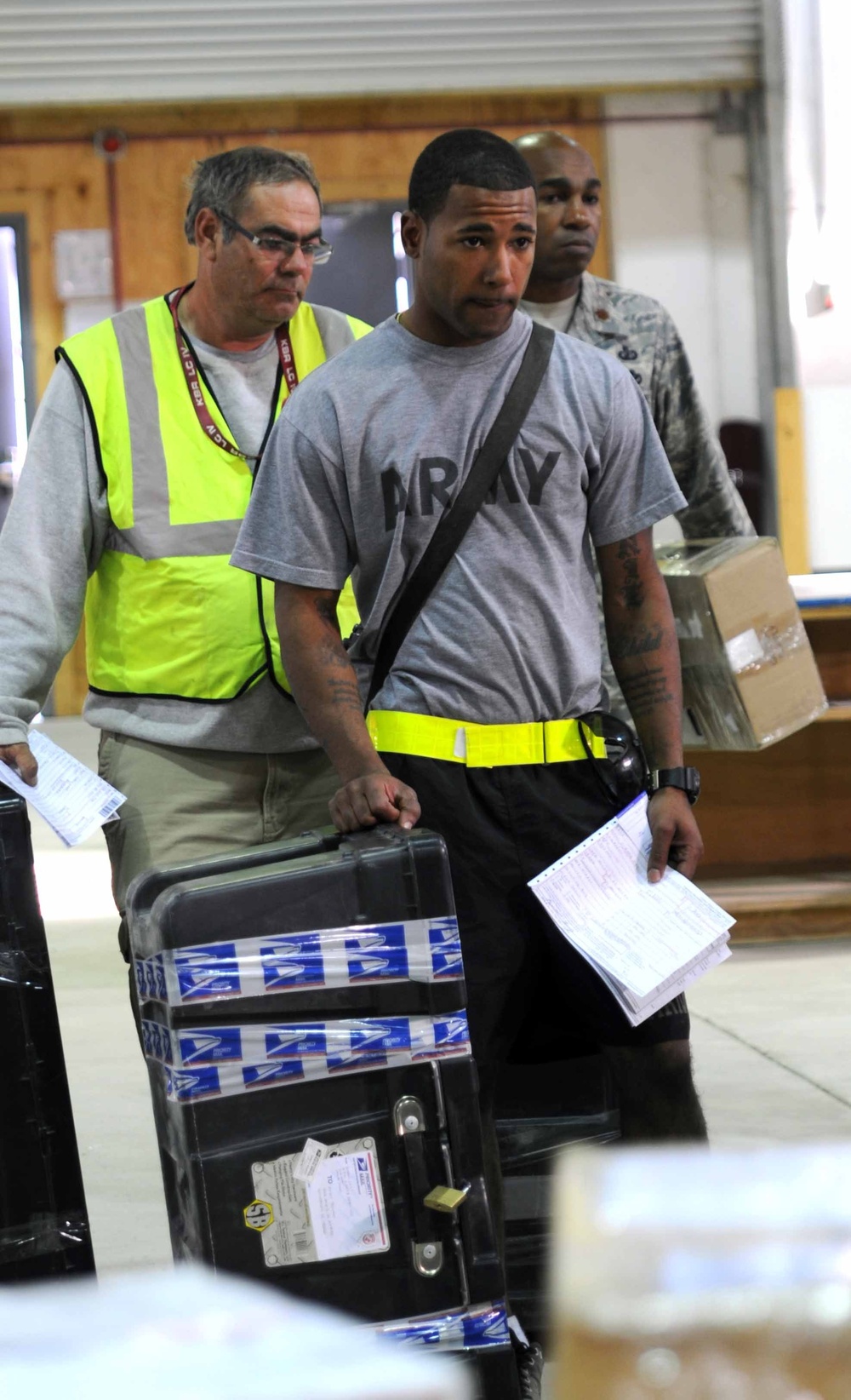 Postal services stop for service members another sign service members are heading home