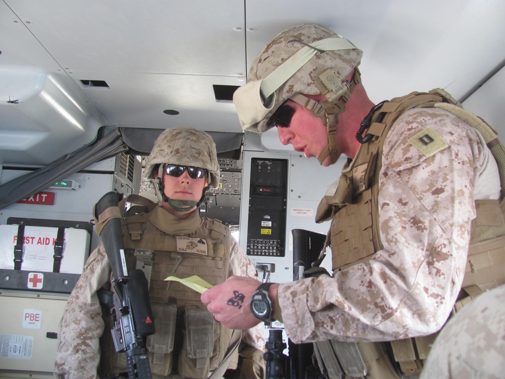 Meritorious promotion, re-enlistment in a combat zone: one Marine does it all
