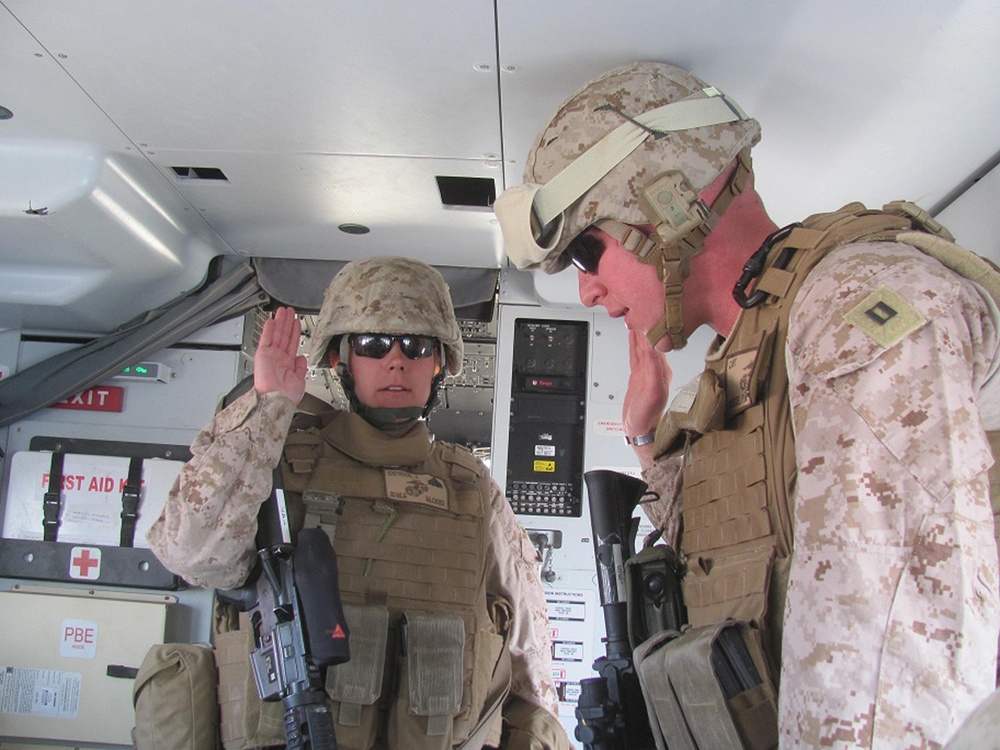 Meritorious promotion, re-enlistment in a combat zone: one Marine does it all