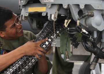 Maintenance on a AH-1Z Super Cobra aboard USS Makin Island