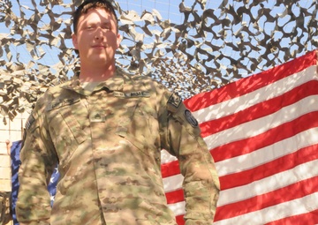 The last swearing in: military dog handler re-enlists indefinitely