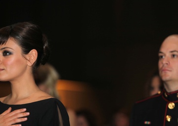 Marine takes actress Mila Kunis to birthday ball
