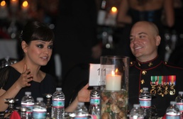 Marine takes actress Mila Kunis to birthday ball