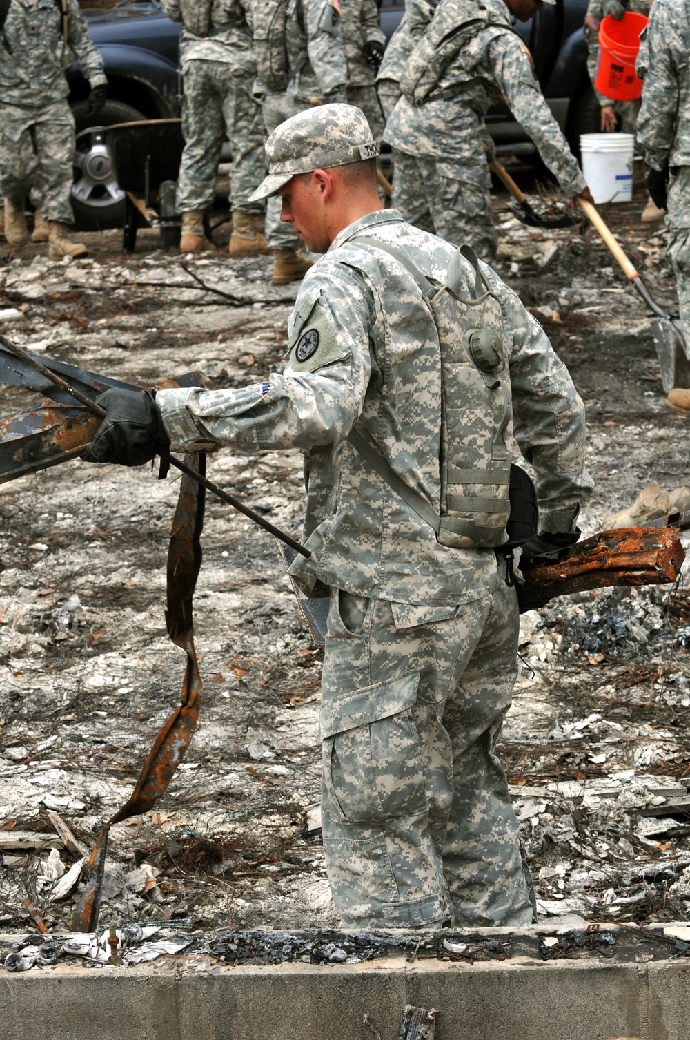 Joint Task Force 71 soldier assists with wildfire clean up