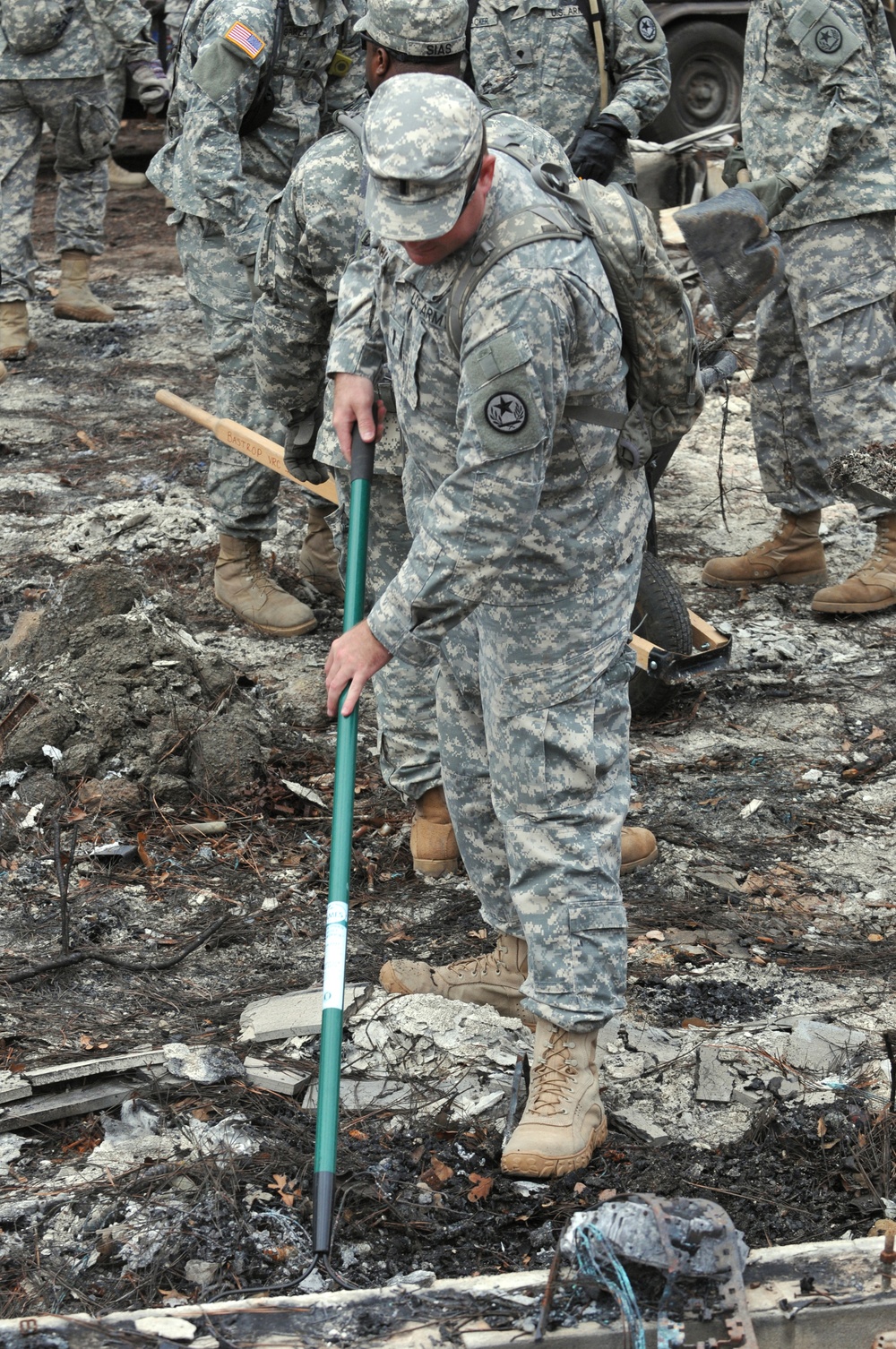 Soldier assists with wildfire cleanup