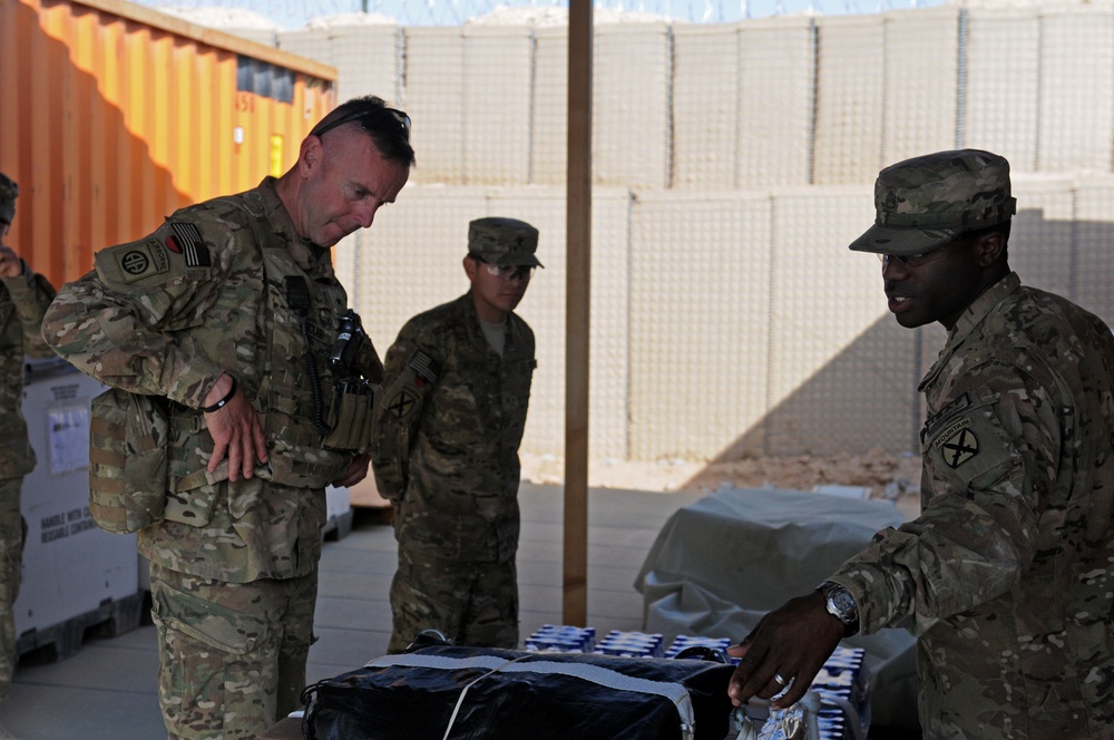 DVIDS Images Brig. Gen. Sinclair listens as soldiers explain