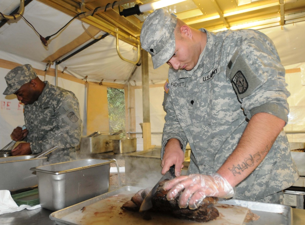 Soldier's carefully prepare award winning meal