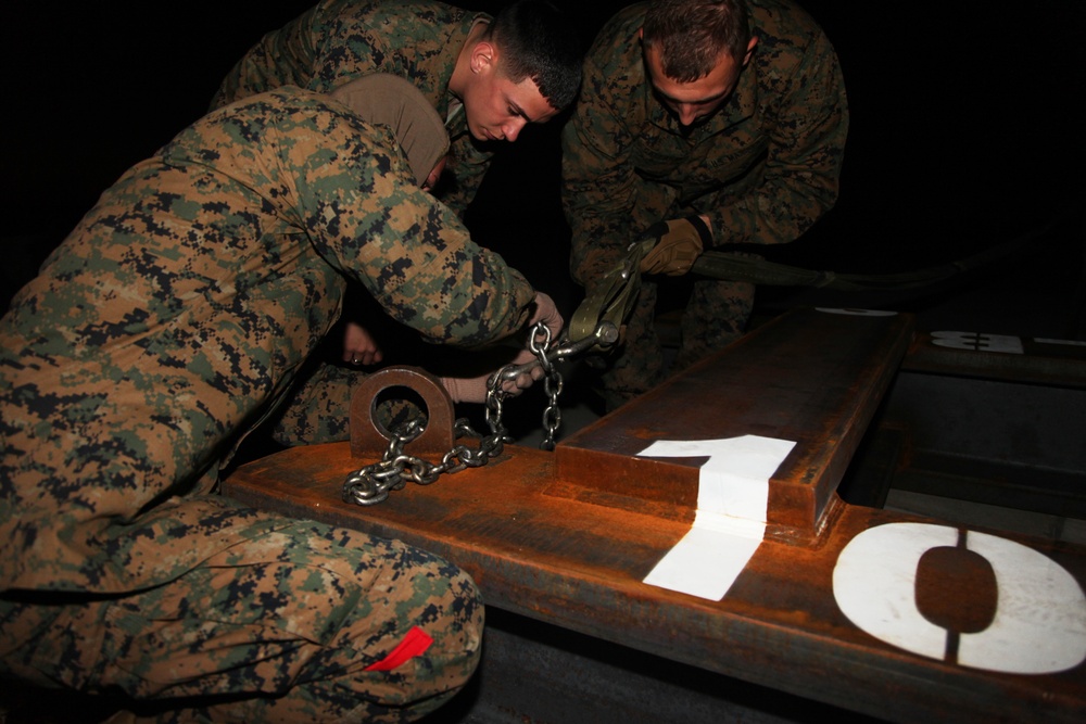 Braving a storm: Marines rig the Osprey