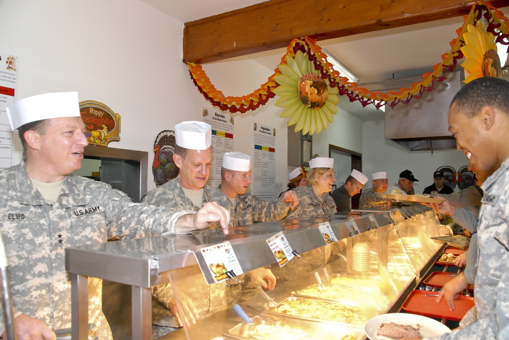 Soldiers share Thanksgiving meal with their soldier family