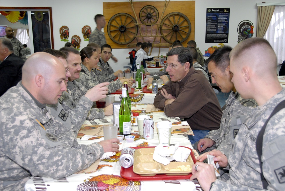 Soldiers share Thanksgiving meal with their soldier family