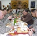 Soldiers share Thanksgiving meal with their soldier family