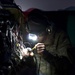 Armament technicians work long nights to keep Apache helicopters in the fight
