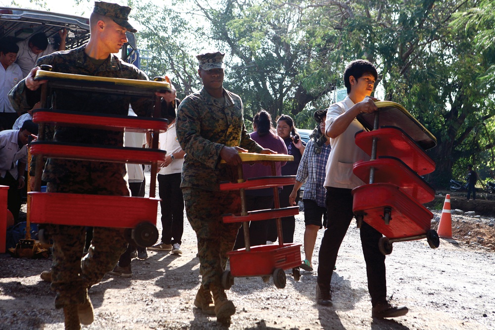 Thai, US military restore services
