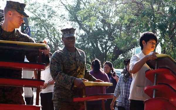 Thai, US military restore services