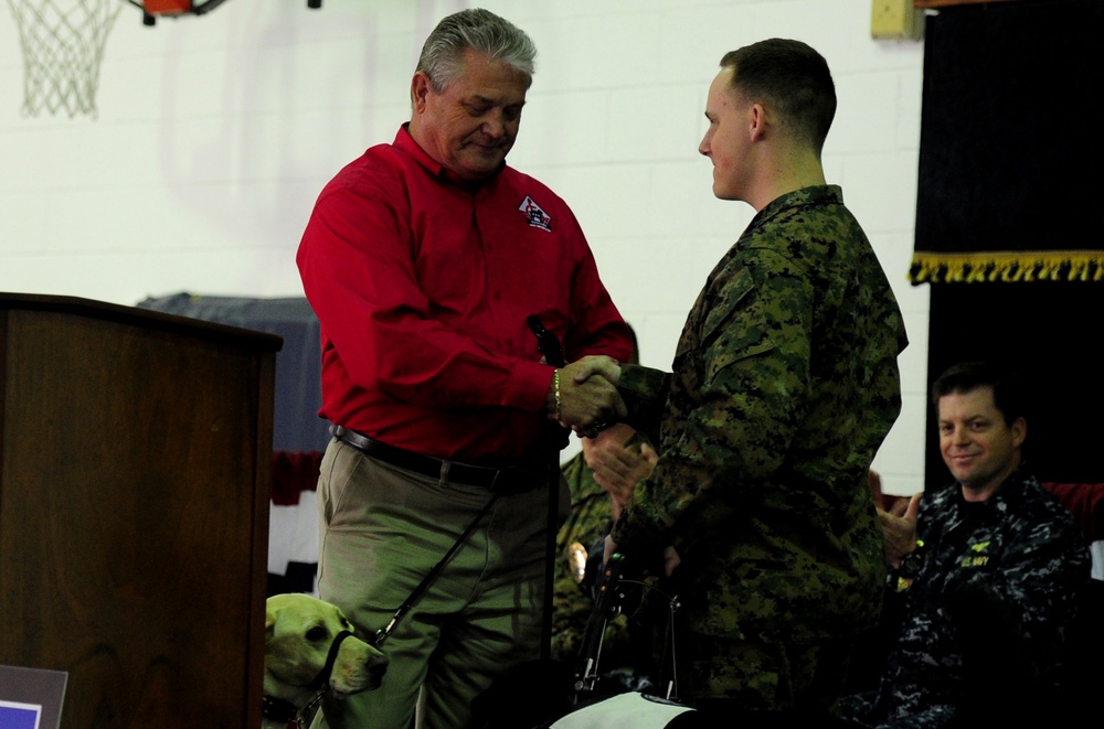 Prisoner-trained service dog is placed with a wounded service member